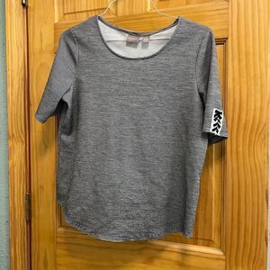 Chico’s size 1 black and white striped top with lace up detail on sleeves